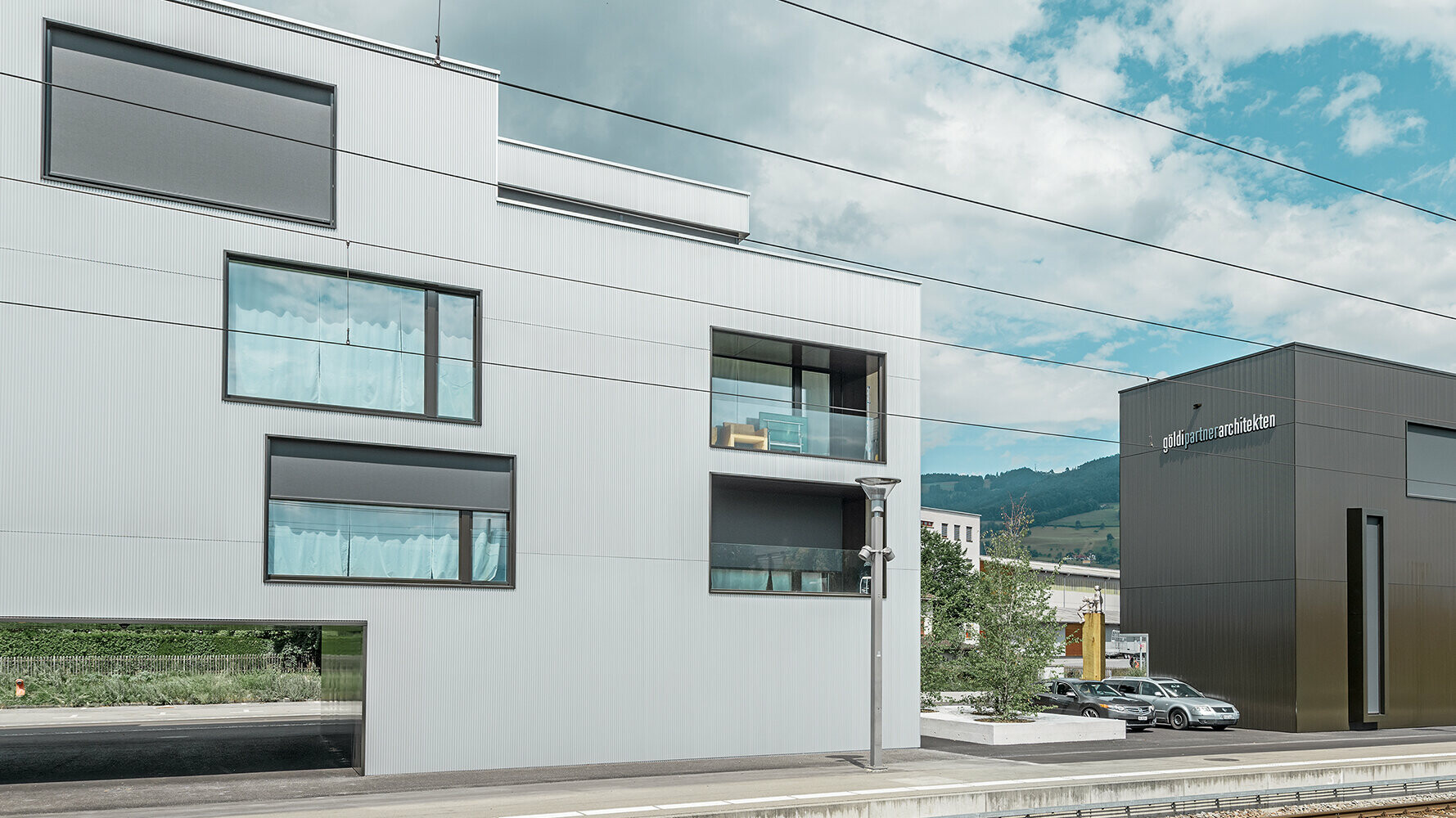 Bostäder och kontorsbyggnader med PREFA-sicksack