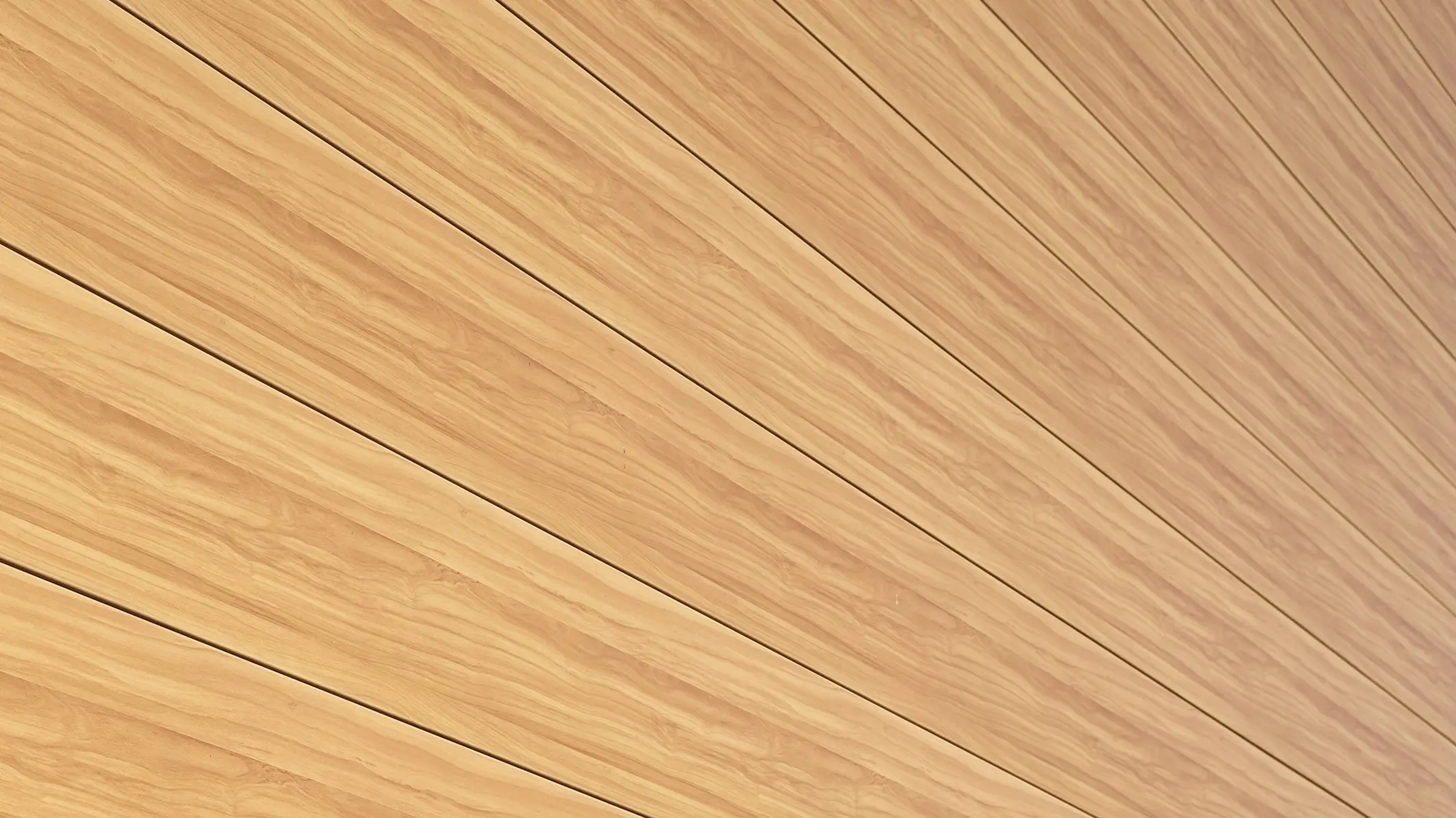 Närbild på aluminiumfasaden av PREFA Siding i färgen ek natur på en villa i Usingen, Tyskland.