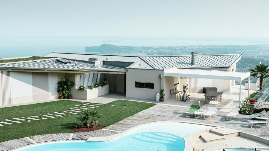 Bostadshus med unikt läge och swimmingpool. Modernt hus med flackt tak som täckts med PREFALZ i färgen patinagrå.