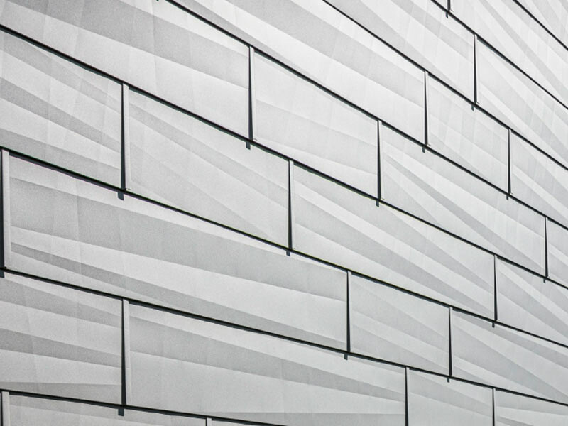 Fasadpanel FX.12 med karakteristiskt kantmönster, P.10 ljusgrå