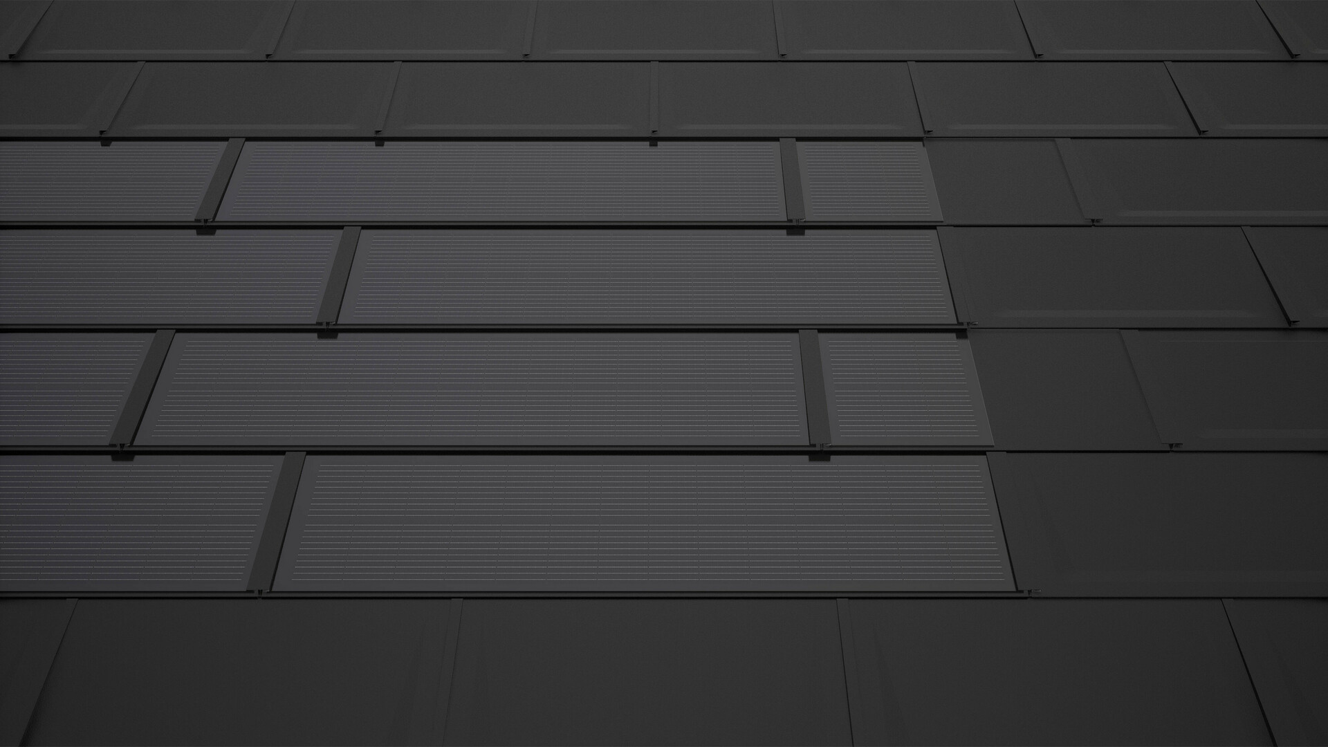 PREFA soltakplattor i svart med kompletteringsplattor. Dessa skapar en rektangulär modulyta och bidrar till ett harmoniskt helhetsintryck på soltaket.